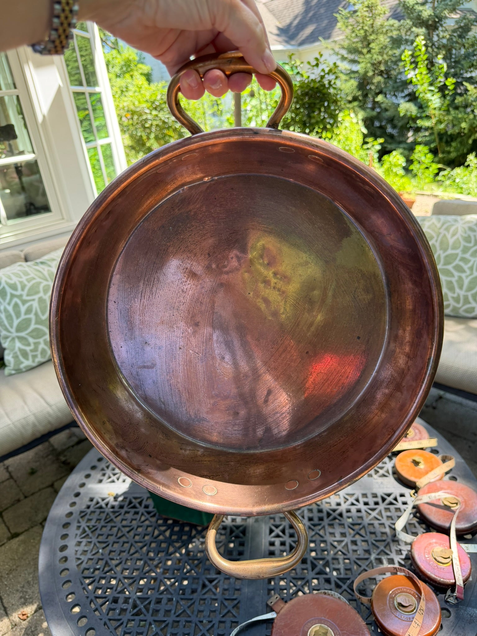 Interior patina of antique English copper jam pan showing authentic age and use.